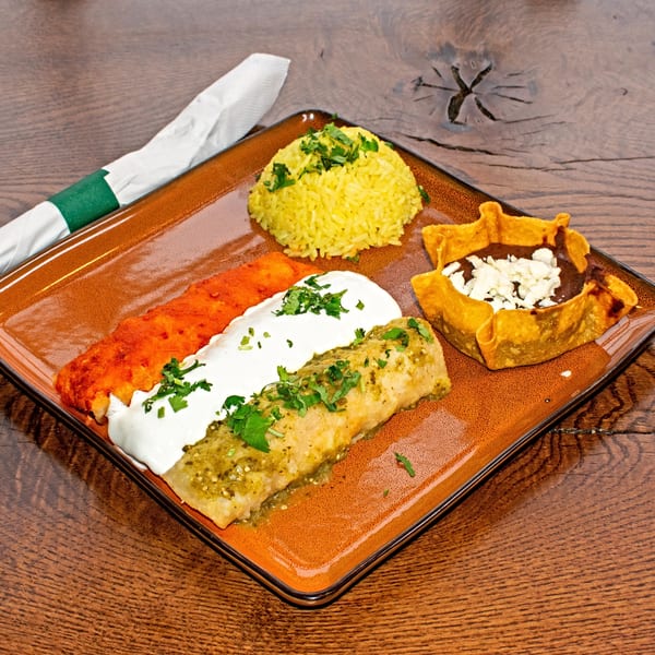 Orale Mexican Restaurant's enchilada platter with red and green enchiladas, rice, and beans in a tortilla bowl.